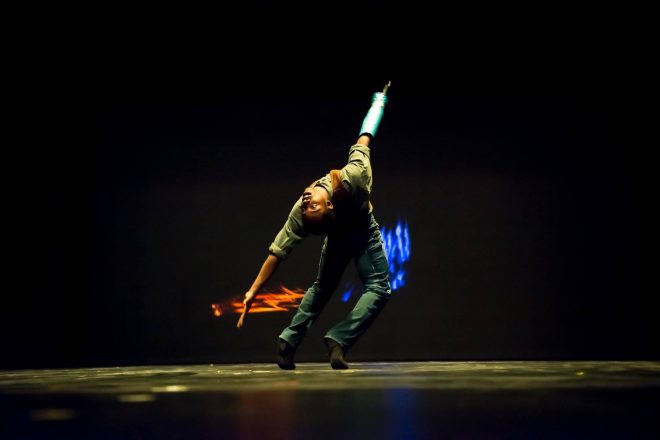 Photograph of a Baltimore School for the Arts student dancing on stage