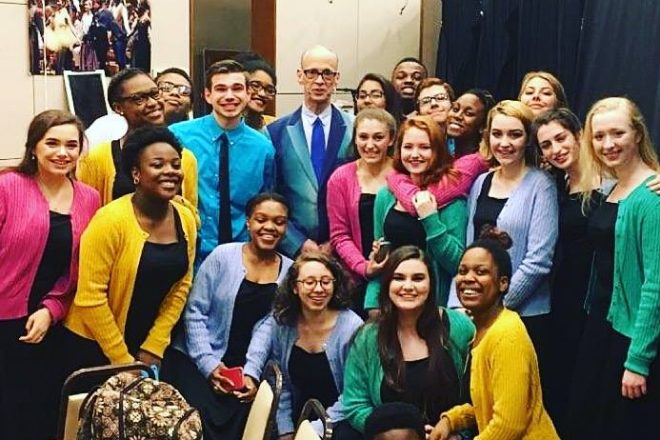 Photograph of Baltimore School for the Arts students with John Waters