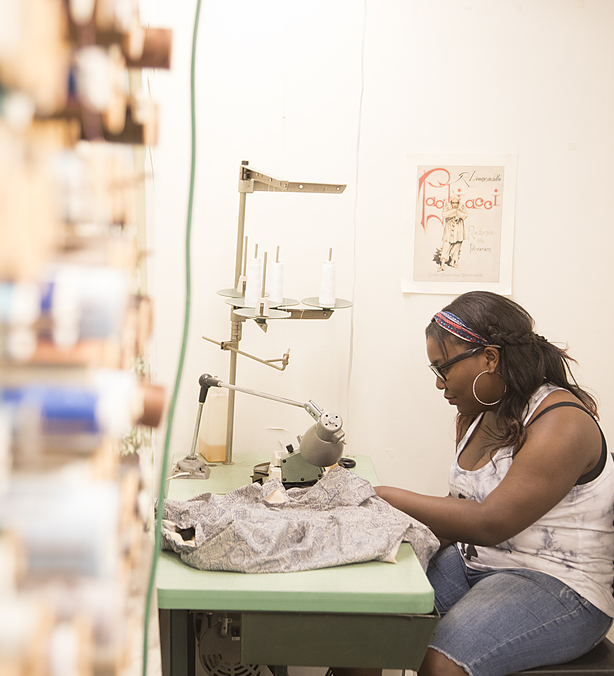 Photograph of a Baltimore School for the Arts student working with textiles