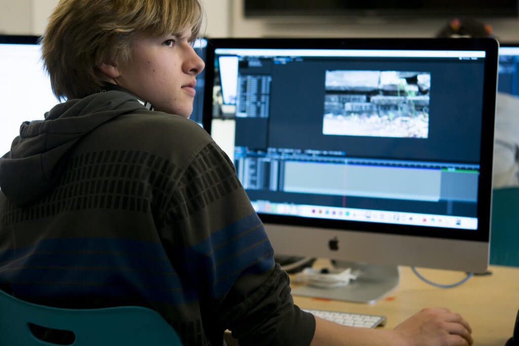 Image of a Baltimore School for the Arts students on a computer