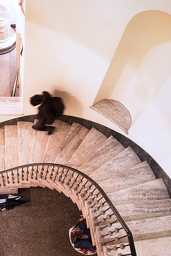 Photograph of student walking down the stairs at Baltimore School for the Arts