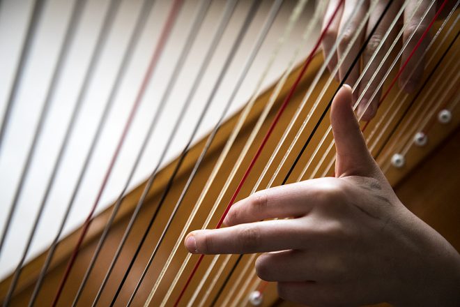 Image of a Baltimore School for the Arts student playing an instrument