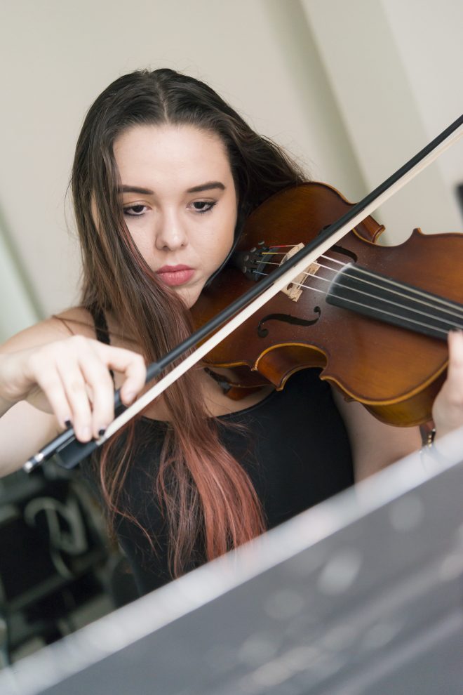 Image of Baltimore School for the Arts student playing a violin